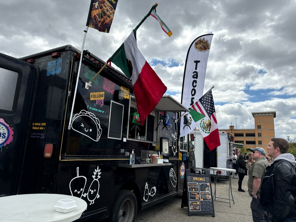 Los Pinches Tacos food truck with Mexican flag in Grand Rapids